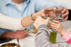 family drinking water