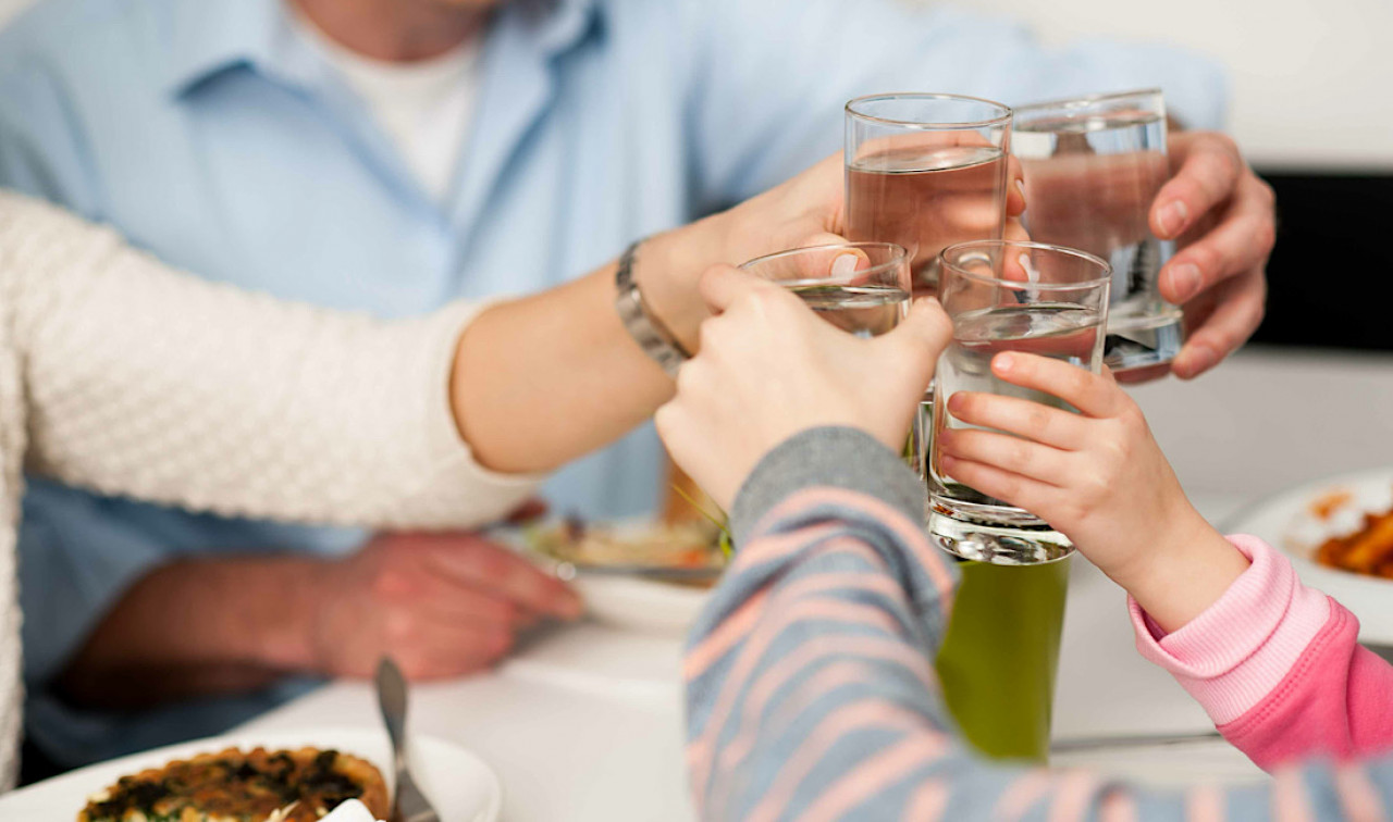 family drinking water